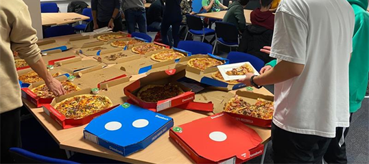 People eating pizza